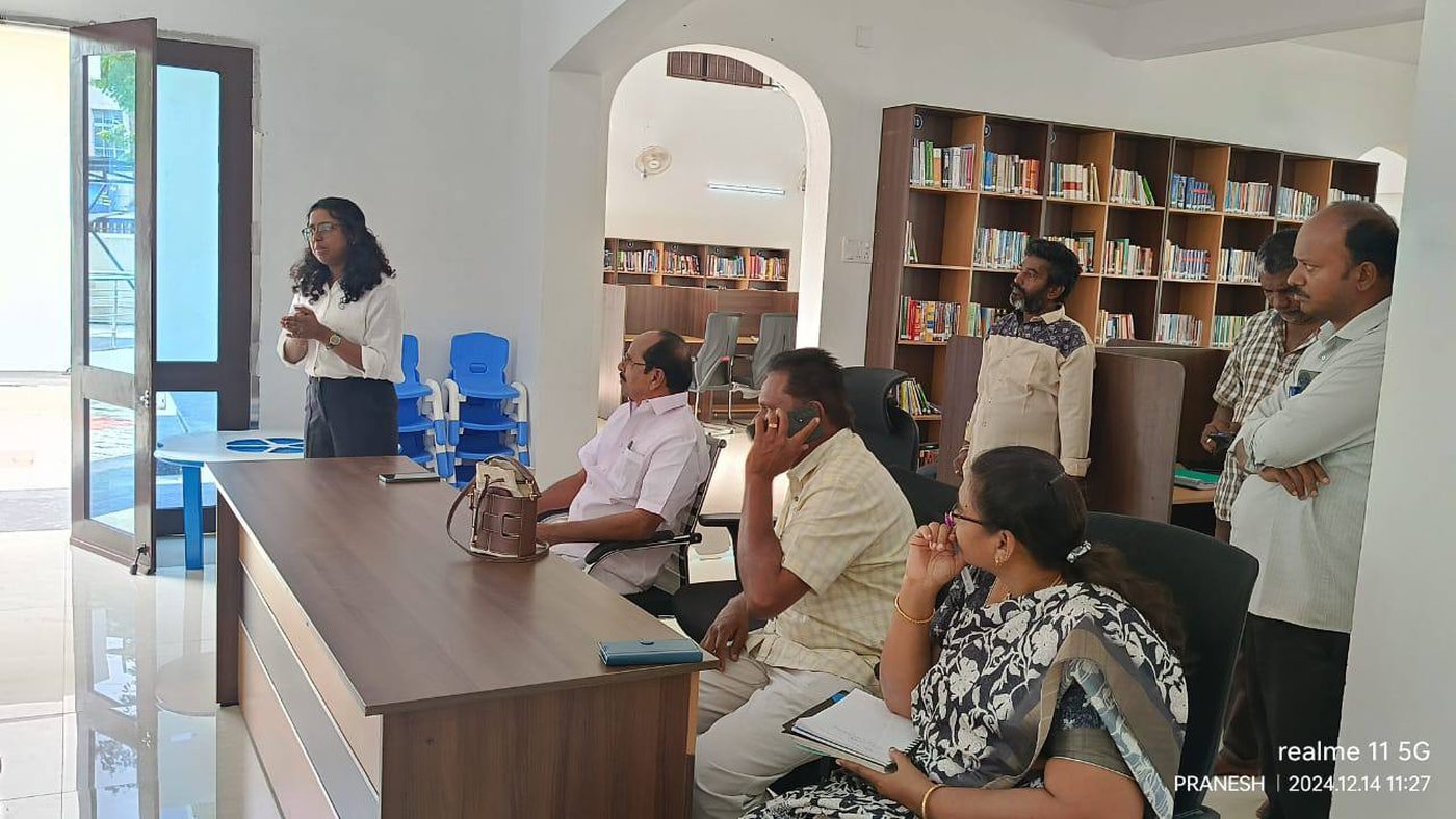 Kaviya speaking to students during a career guidance session