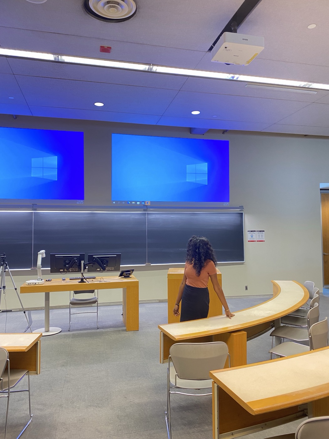Kaviya presenting a business case to her graduate class in Toronto